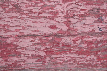 red old peeling paint on an old