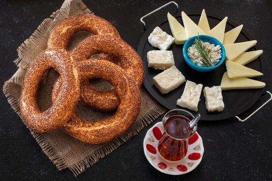 Traditional Turkish bagel simit on the table with black background
