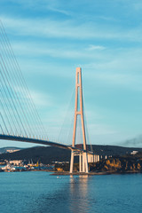 Fototapeta premium Details of the Russian bridge against the blue sky.
