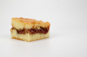 Guava real dough cake isolated in white background. Sweet dough cake with guava inside.