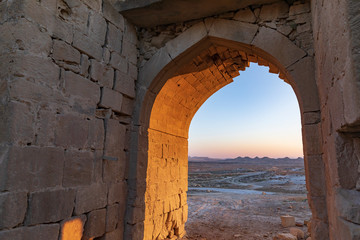 The ruins of an ancient caravanserai in the desert