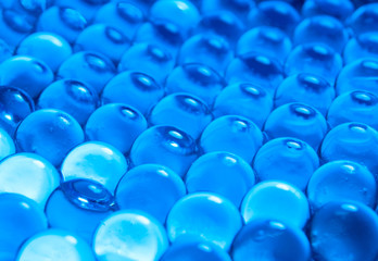 Texture of blue gel balls with blur