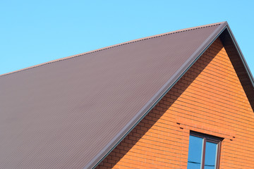 House with a roof made of metal sheets