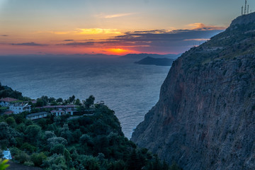 Sun setting over mediterranean sea