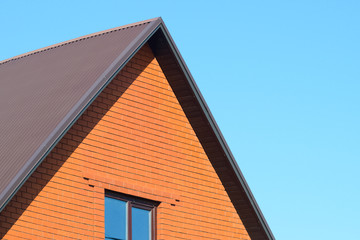 House with a roof made of metal sheets