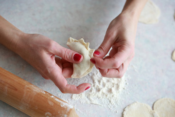 home cooking dumplings to sculpt the hands out of the dough