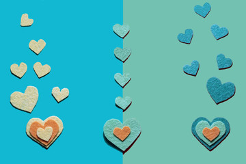 Felt hearts on the green and blue background.