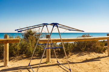 Camping on beach, empty clotheshorse