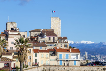The medieval town of Antibes in the south of France with the alps in the background