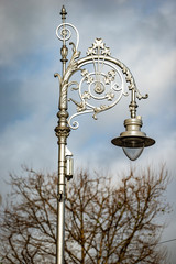 Fototapeta na wymiar old lantern on background of blue sky, dublin, ireland,irland
