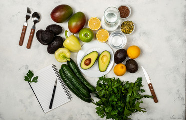 A variety of healthy and wholesome foods: vegetables, fruits, berries, herbs, seeds. Top view.