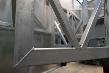 metal frame construction. Metal pipes skeleton construction.