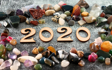 Fototapeta na wymiar Happy New Year 2020. The number 2020 on black and white background.