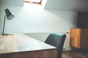Detail of Room with Wooden Writing Desk and Table Lamp Minimalist Style