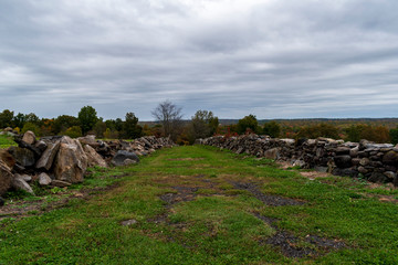 path with old stone walls in countryside setting