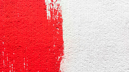 Unfinished red painted rough white wall background