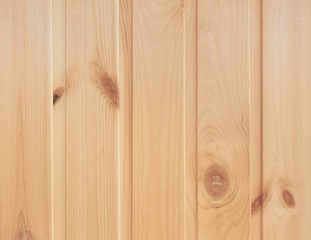 Background of vertical wooden planks. Background made of natural natural materials made of wood pine	