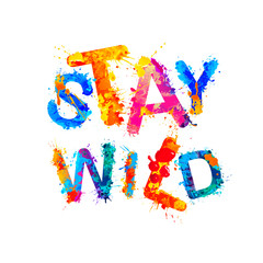 Stay wild. Motivational splash paint inscription