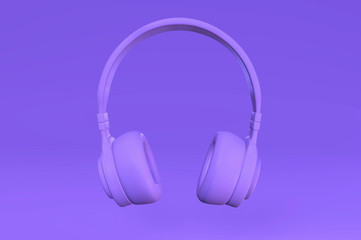 Fototapeta na wymiar Purple headphones on monochrome background