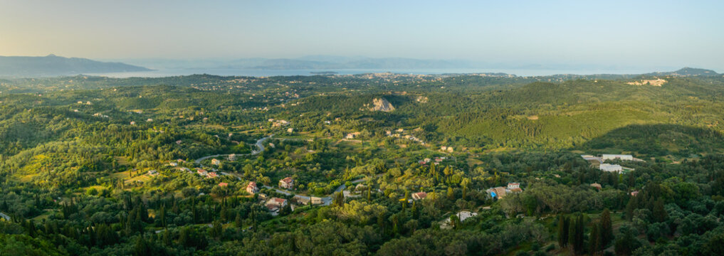Corfu, a small town built in the mountains between the trees, panorama from the Kaiser throne vantage point.