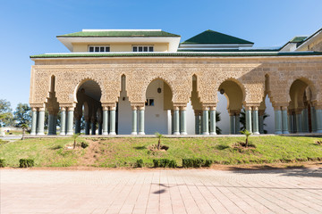 Fototapeta premium Traditional and typical moroccan architectural details. Mosque in Kenitra, Province West Chrarda Beni Hussein, Morocco. Construction detail, sunny day.