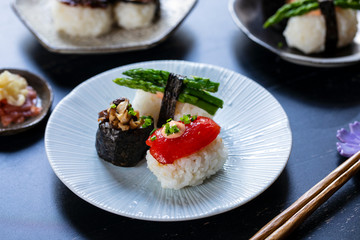 Vegan sushi with tomato, mushroom and asparagus