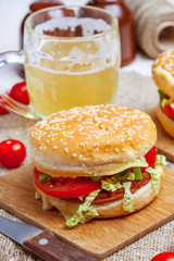 Homemade hamburger with fresh vegetables.