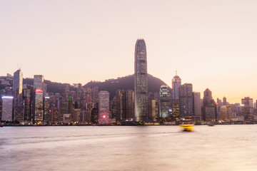 Panorama of Victoria harbor of Hong Kong city, from day to night Cold front in December.