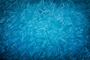 Background of blue cold winter ice. Texture of frozen surface. Frost pattern