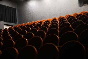 red seats in the cinema auditorium
