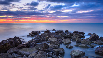 Scogliera con un' alba fantastica, spiaggia di Duna Verde, Caorle, Veneto