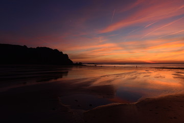Ouasine Bay, Jersey, U.K. Winter coastal sunset.