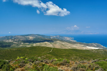 Mountain peaks, rocks and sea on Zakynthos island in Greece.