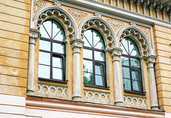 Vintage facade and windows of an old building