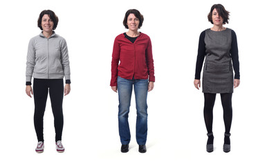 Obraz premium woman dressed in sportswear, casual clothes and dress on white background