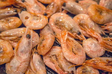 Large shrimp fried grill close-up.
