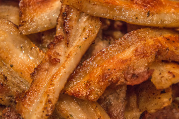 Grilled pork bacon close-up. Fried meat.