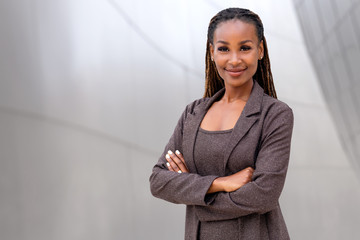 Beautiful female african american business woman CEO, legal, financial, attorney, confident with arms folded