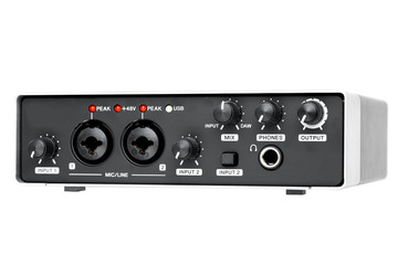 USB Audio interface front panel for Home recording or Mixing, external sound card black and silver color isolated on white background.