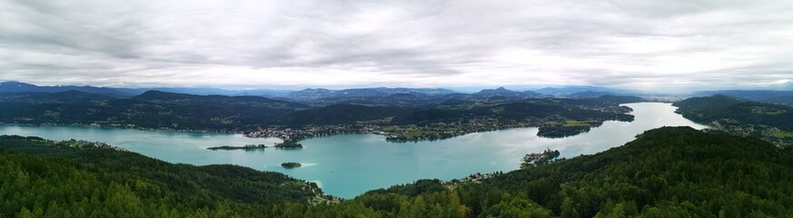 Fototapeta na wymiar Panoramic view of a lake in green nature