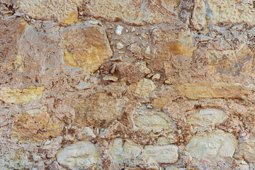 old stone and stucco wall