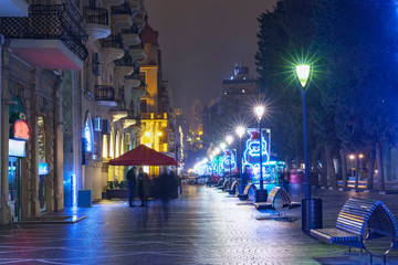 Fototapeta na wymiar The central street decorated with New Year's garlands in Baku