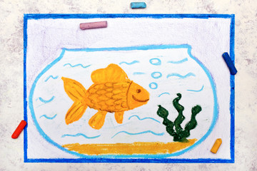 Photo of colorful drawing: Smiling goldfish in blue fishbowl. Fish with bubbles in glass - 312410374