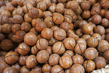 Macadamia nuts texture Background with dried