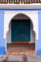 Traditional typical moroccan architectural details in Chefchaouen, Morocco, Africa Beautiful street of blue medina with blue walls and doors and windows. Most popular destination for travelers.