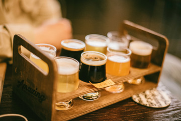 Close up of craft beer tasting flight on a bar table