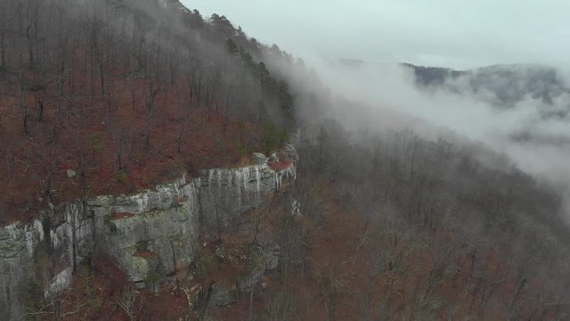 Slow Aerial of Cold Fog Forest Mountain Terrain