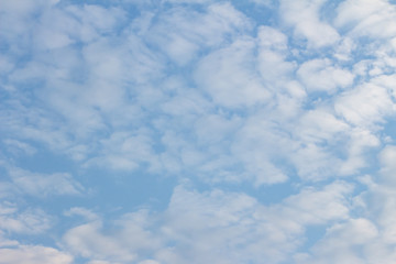 White clouds in the blue sky. Background. Texture