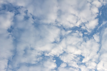 White clouds in the blue sky. Background. Texture