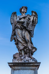 Marble statue of angel from the Sant'Angelo Bridge in Rome, Italy